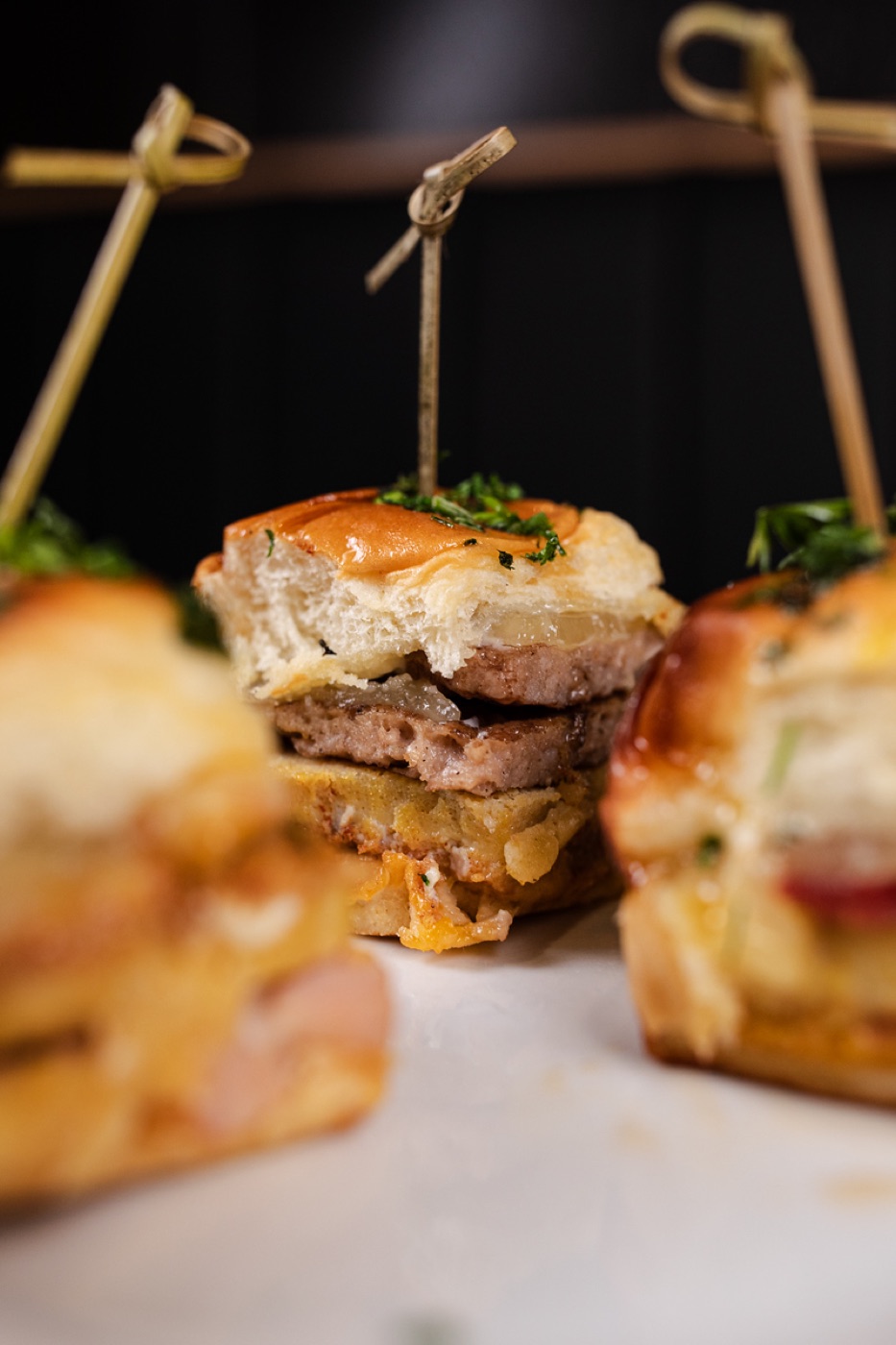 Burger sliders with melted cheese, close up