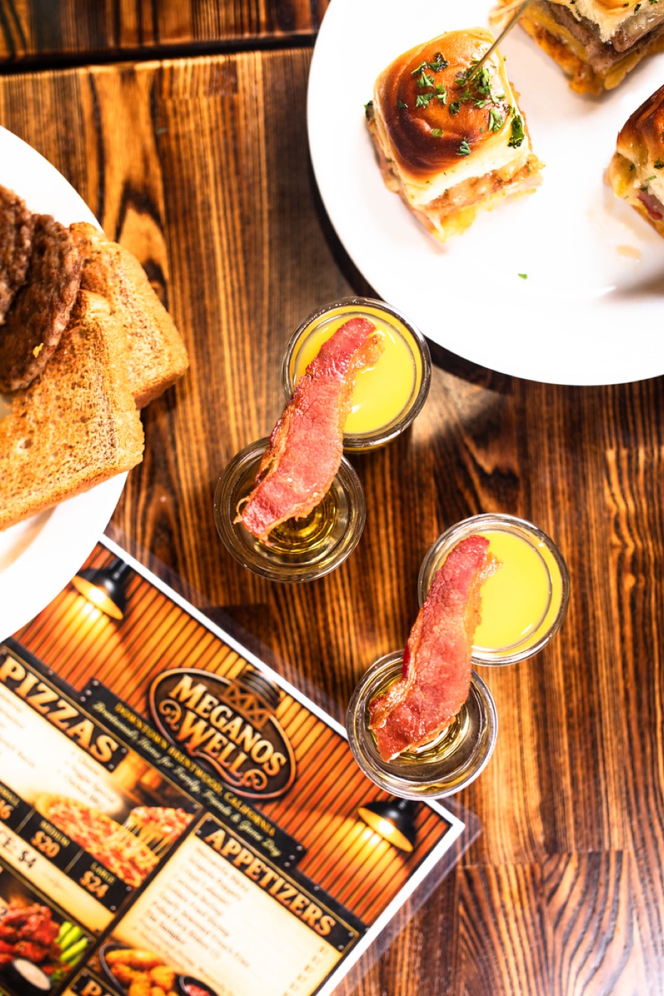 Bacon-garnished shots and the menu seen from above